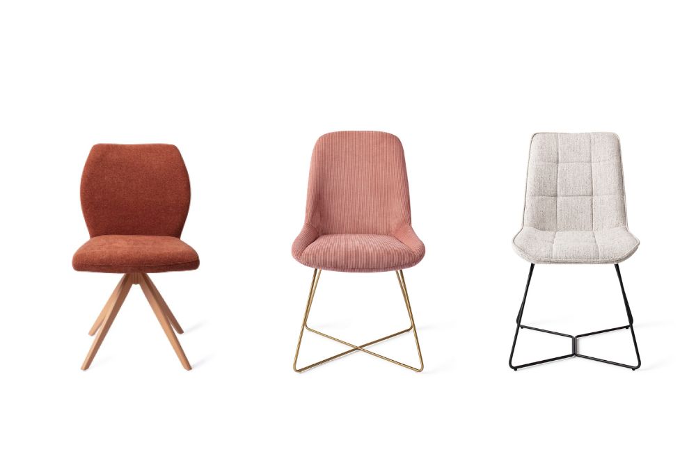 three dining chairs without armrests