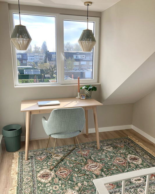 blue chair with gold frame on rug in study under desk with home decor 4